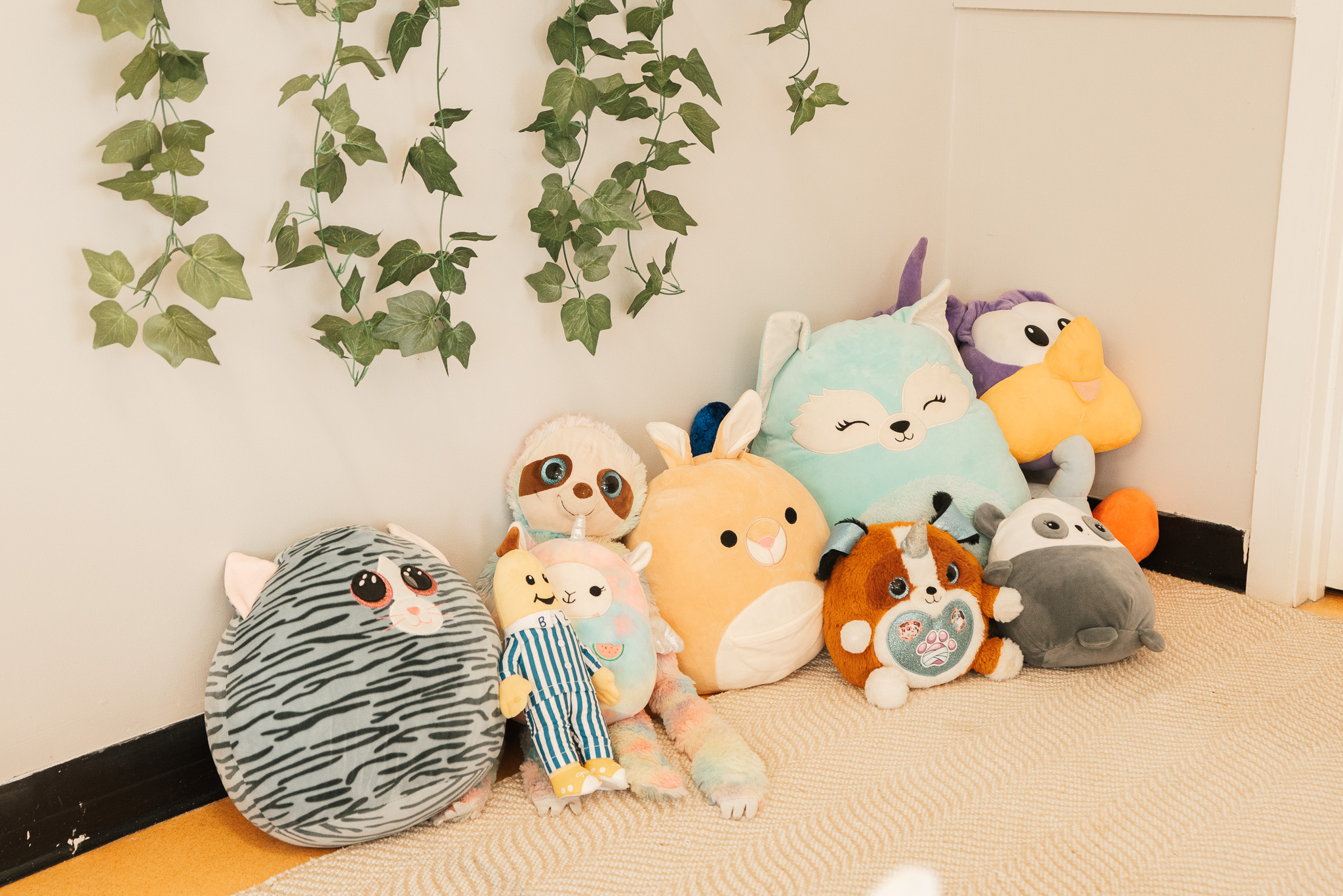 Soft animal cushions in a cosy quiet corner